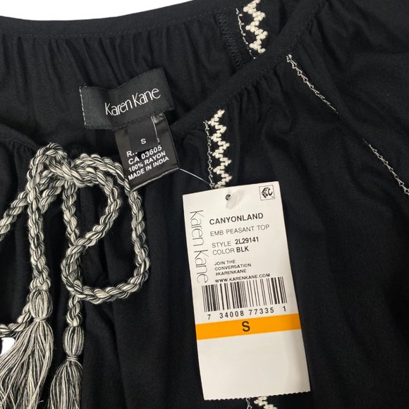 NWT Black Karen Kane Blouse with White Embroidered Zig-Zag and Tassel Si… - Picture 7 of 9